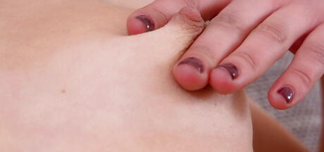 Gracile blond youthful Malvina reveals her butt in fancy shorts and shaved pussy 